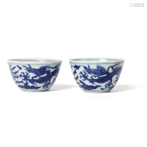 TWO BLUE AND WHITE 'DRAGON AND PHOENIX' CUPS WANLI MARK AND ...