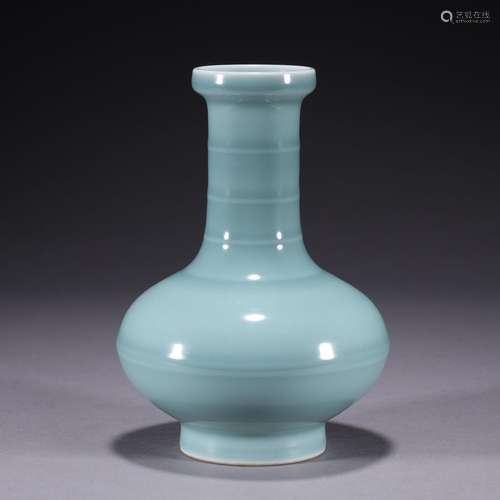 A celadon-glazed vase