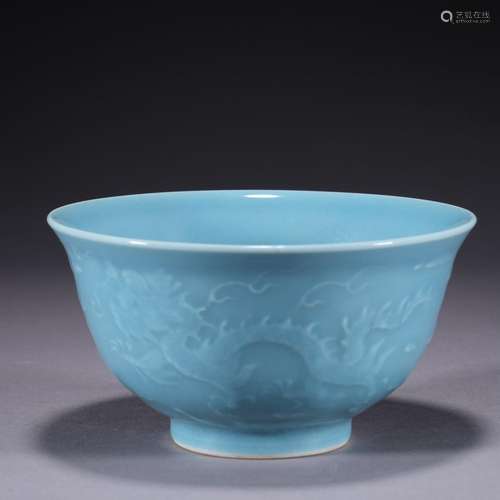 A celadon-glazed 'dragon and phoenix' bowl