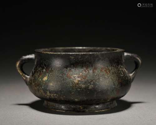 A bronze censer