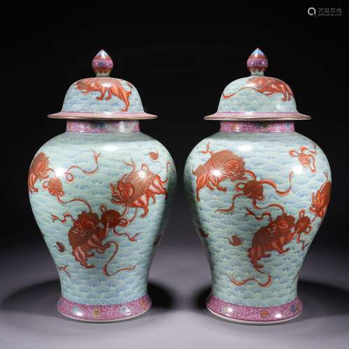 A pair of famille-rose 'beast' jar and cover