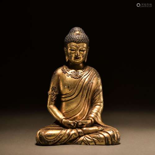 A gilt-bronze statue of Sakyamumi