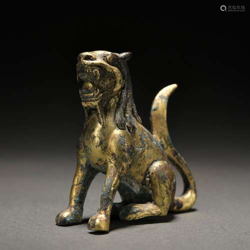 A gilt-bronze beast