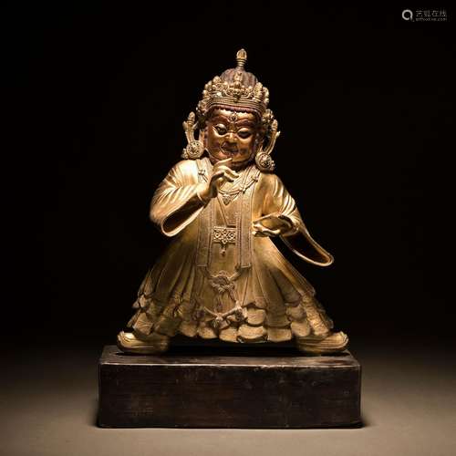 A gilt-bronze statue of Vajrapani