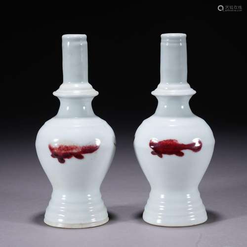 A pair of copper-red-glazed 'fish' vase