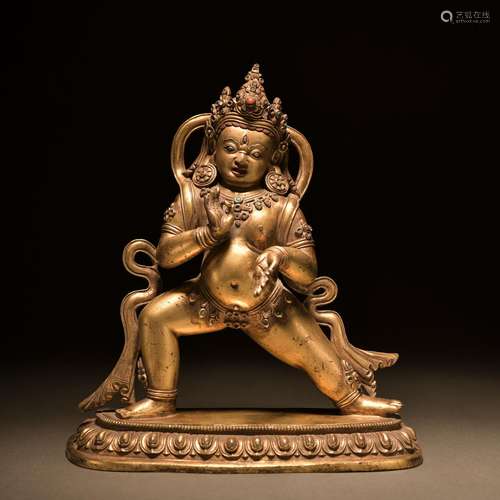 A gilt-bronze statue of Mammon