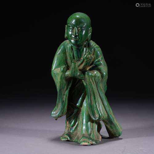 A green glazed statue of arhat