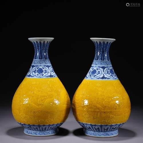 A yellow glazed blue and white 'phoenix' pear-shaped vase