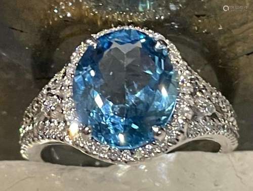 BLUE TOPAZ AND DIAMOND RING