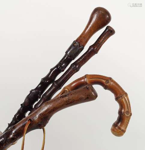 GROUP OF 4 EARLY 20TH-CENTURY WALKING STICKS