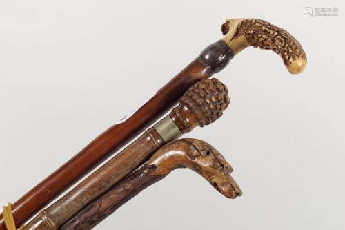 GROUP OF 3 EARLY 20TH-CENTURY WALKING STICKS