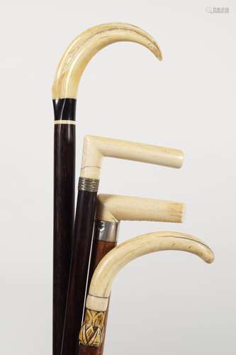 GROUP OF 4 INTERESTING WALKING STICKS