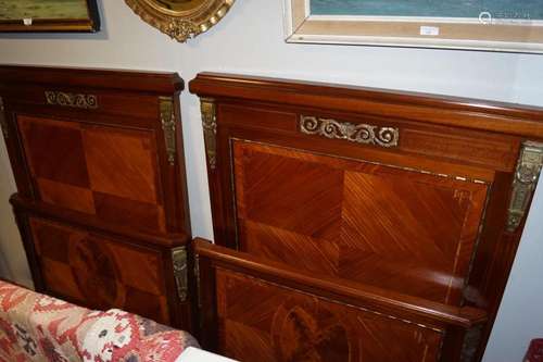 PAIR OF MAHOGANY AND BRASS BOUND BEDS