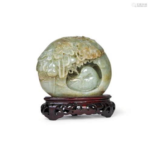 A CHINESE CARVED JADE FIGURE OF A DUCK IN A NEST, QING DYNAS...
