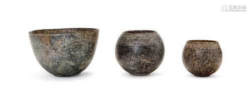 THREE CHINESE CARVED STONE POTS, PROBABLY PREHISTORIC/WARRIN...