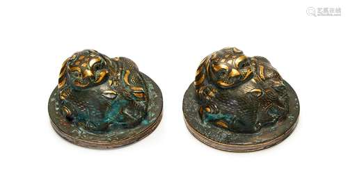 A PAIR OF EMBELLISHED GILT BRONZE, SILVER INLAID BRONZE WEIG...