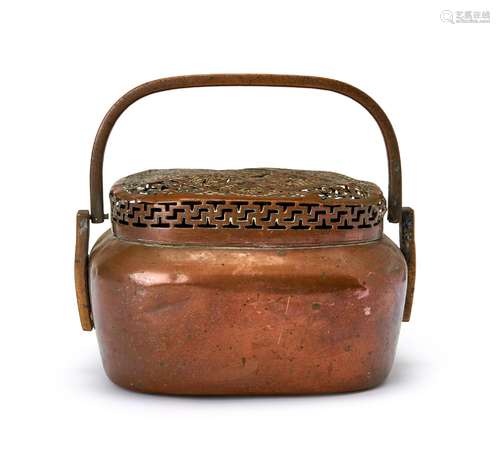 A CHINESE ENGRAVED COPPER HAND WARMER, QING DYNASTY (1644-19...