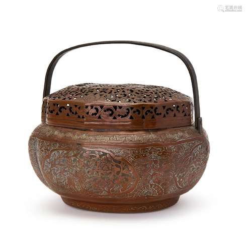 A CHINESE ENGRAVED COPPER HAND WARMER, QING DYNASTY (1644-19...