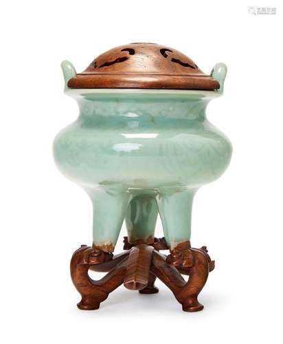 A CHINESE GLAZED CELADON TRIPOD INCENSE BURNER, 18TH CENTURY...