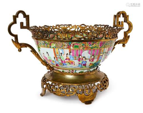 A LARGE CHINESE FAMILLE ROSE BOWL MOUNTED ON BRONZE, QING DY...