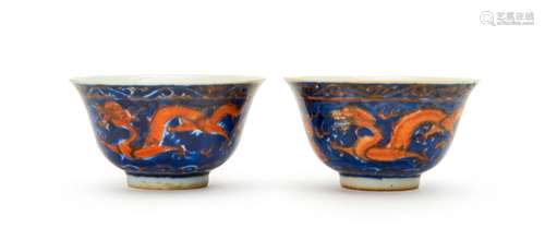 A PAIR OF CHINESE BLUE & IRON RED BOWLS, KANGXI SIX CHAR...