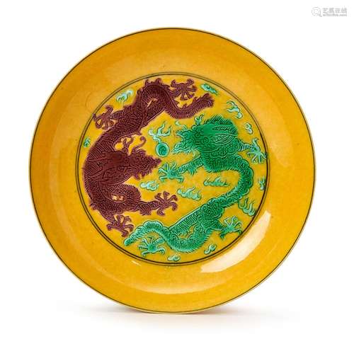 A CHINESE YELLOW GROUND AUBERGINE DRAGON DISH, QING DYNASTY ...