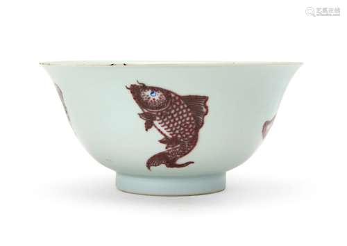 A CHINESE UNDERGLAZE COPPER RED "FISH" BOWL, QING ...