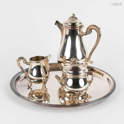 Christofle, a Chocolatière, sugar pot and milk jug on a serv...