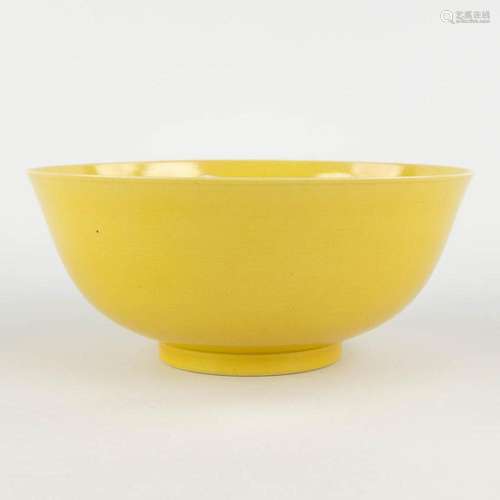 A Chinese bowl with monochrome yellow glaze, Tonghzi mark an...