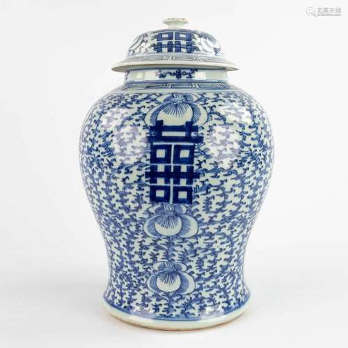 A Chinese baluster vase with lid, blue-white decor of Double...