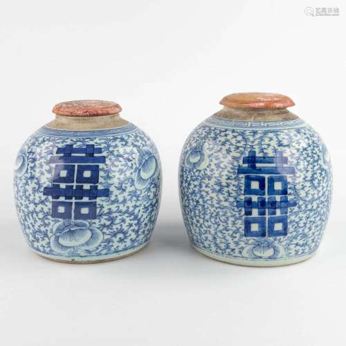 A pair of Chinese ginger jars with a wood lid, double xi-sig...