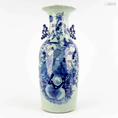 A Chinese vase, blue-white decorated with a bird. 19th/20th ...