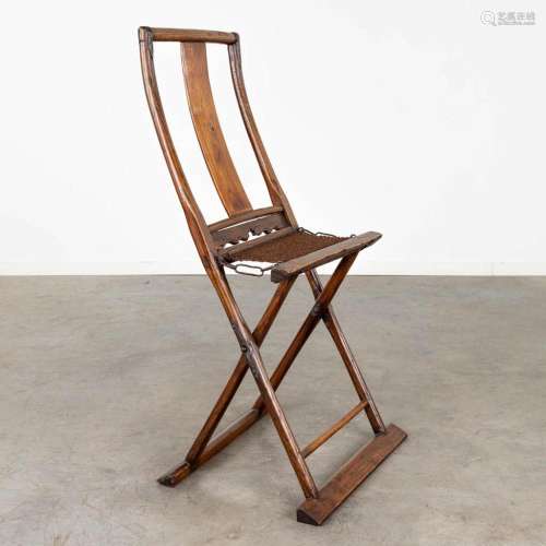 An antique Chinese travellers folding chair, probably 18th/1...