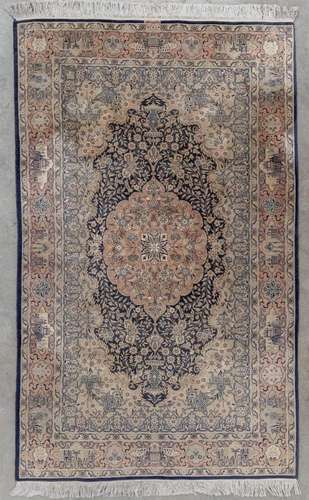 A hand-made Oriental carpet, Mogul, Pakistan. Wool. (D:221 x...