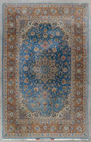 An Oriental hand-made carpet, Isfahan. Signed. (D:238 x W:15...