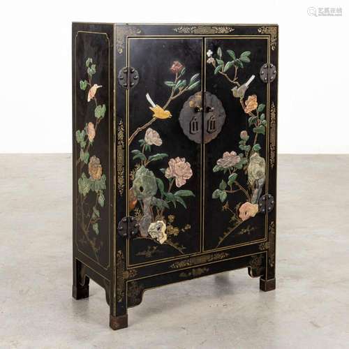 A Chinese two-door cabinet with Chinoiserie decor, hardstone...