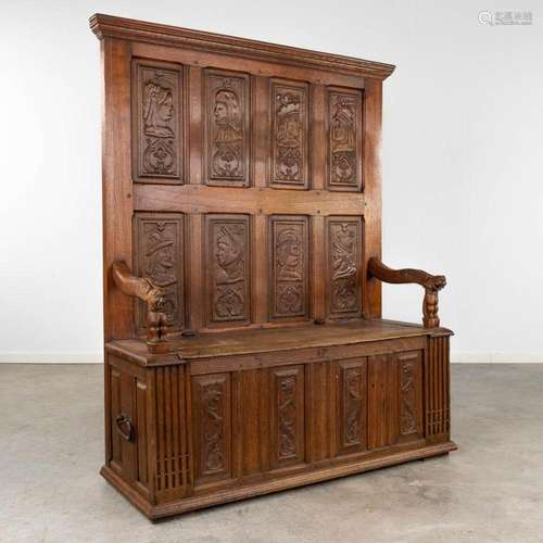 An antique hall bench with sculptured figurines, oak, Flande...