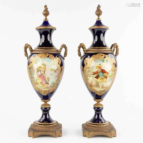 Sèvres, A pair of kobalt blue, bronze mounted and hand paint...