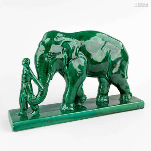 A figurine with an Elephant, Glazed faience, Art Deco. Signe...