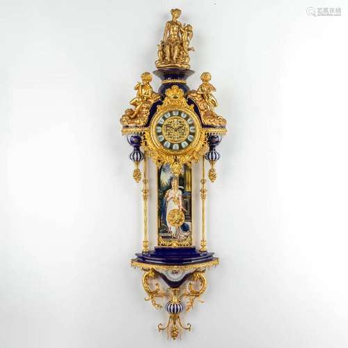 An exceptional clock, porcelain mounted with brass and hand-...