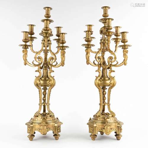 A pair of candelabra with 7 candle holders, bronze with myth...
