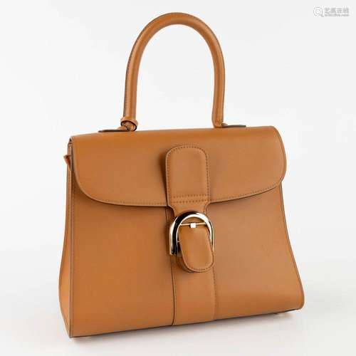 Delvaux Brilliant MM, a handbag made of brown leather. Like ...