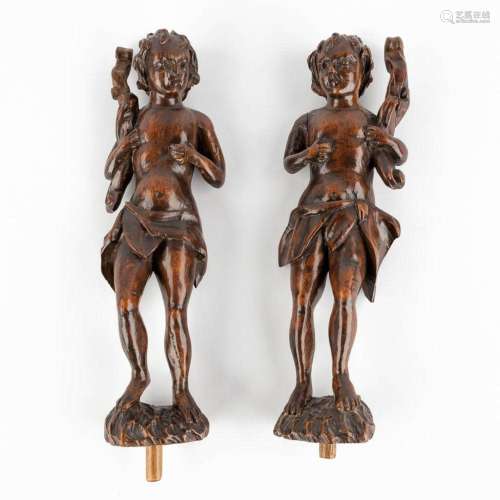 A pair of wood-sculptured figurines of young men, 18th C. (H...