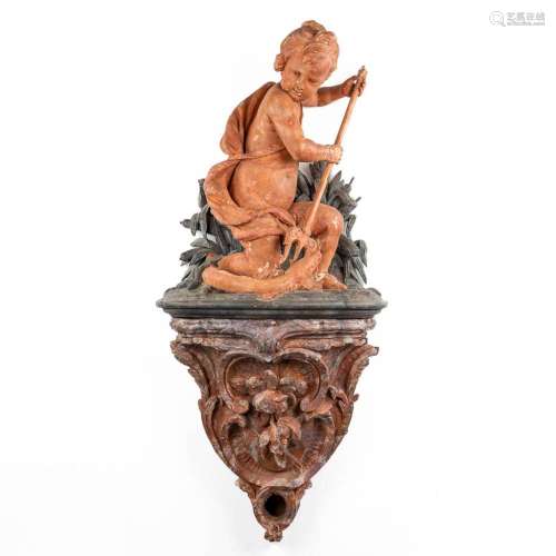 An exceptionally large wood sculptured putti on a console, 1...