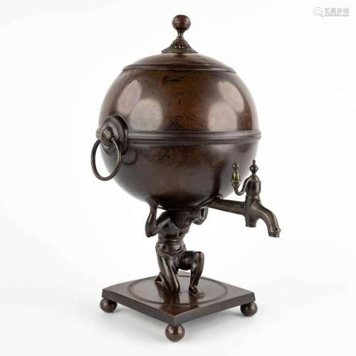 A bronze samovar with a figurine of Atlas supporting a globe...