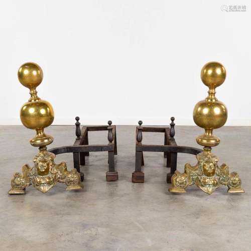 A pair of antique Flemish fireplace bucks made of bronze. Lo...