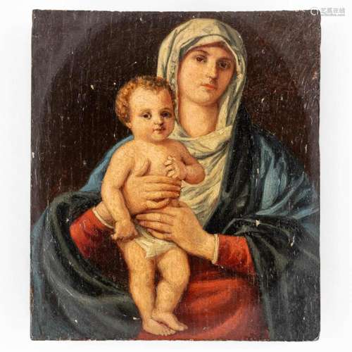 An antique painting 'Madonna with child', oil on pan...