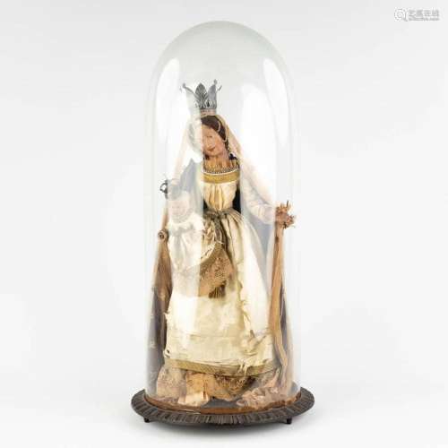 A large figurine of Madonna and child, Wax under a glass dom...