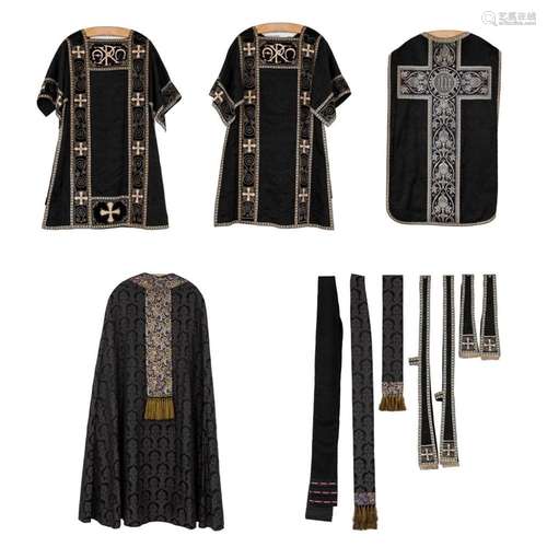 A Roman Chasuble, Two Dalmatics and a Cope. Black textile wi...