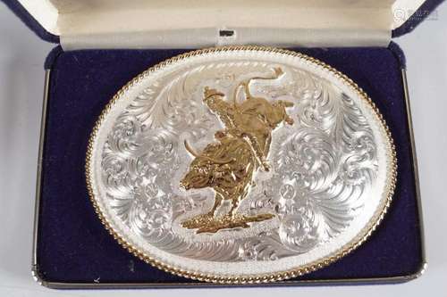 CASED RODEO BELT BUCKLE